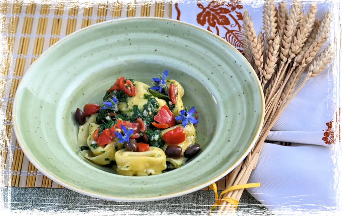 Tortelloni di ricotta con borragine e olive taggiasche