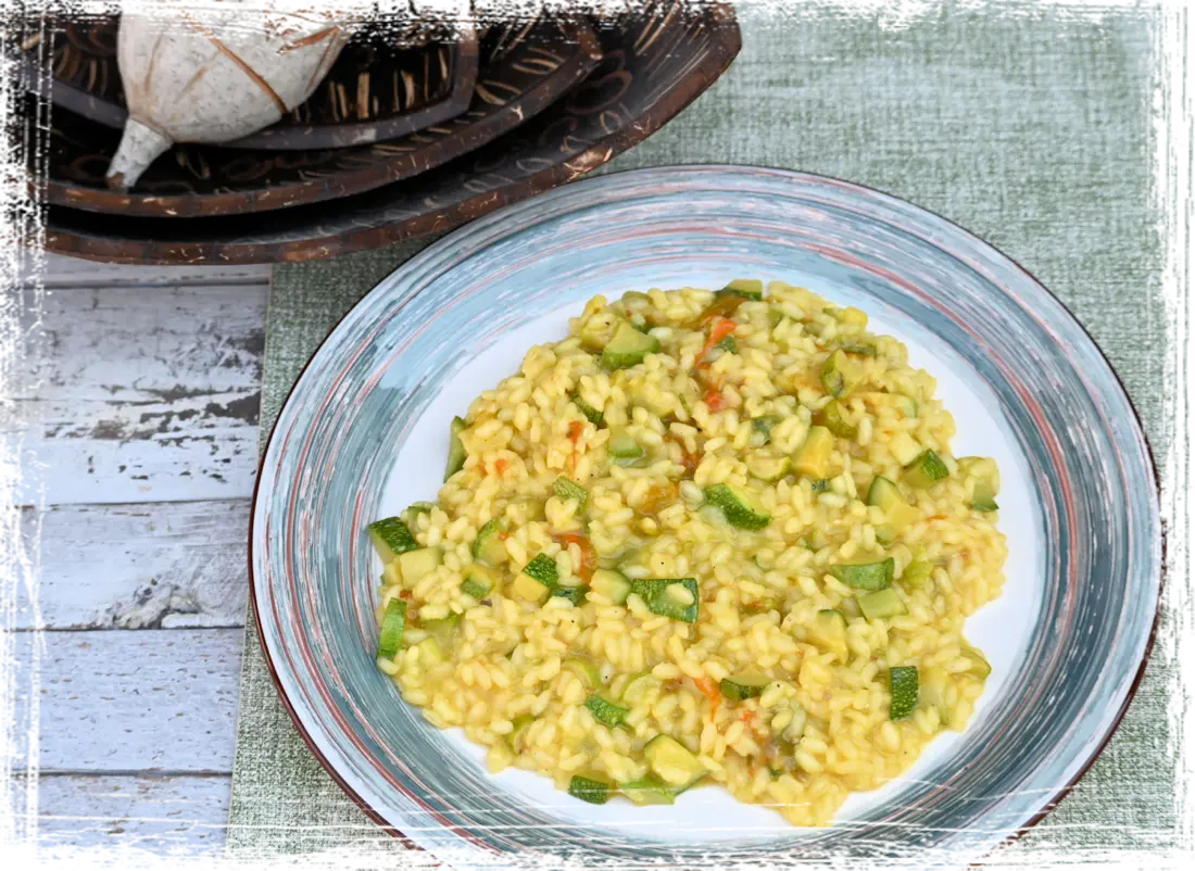 Risotto con le zucchine e i suoi fiori allo zafferano