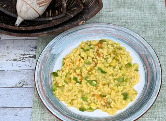 Risotto con le zucchine e i suoi fiori allo zafferano